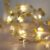 Lights4fun 40er Micro LED Girlande goldene Stoff Sterne
